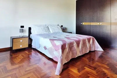 Letto o letti in una camera di Attico con Parcheggio Privato