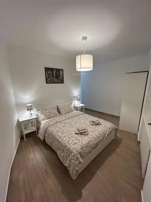 Letto o letti in una camera di Il Centro Apartments-Salsomaggiore Terme