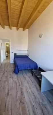 Letto o letti in una camera di Galli Guest House