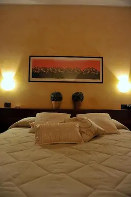 Letto o letti in una camera di Hotel Parco