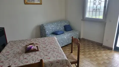 Area soggiorno di Casa di Alba - Alloggi turistici