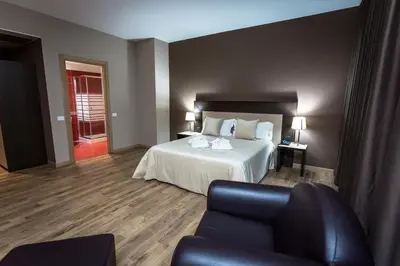 Letto o letti in una camera di HOTEL DON CAMILLO