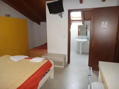 Letto o letti in una camera di Agriturismo San Valentino