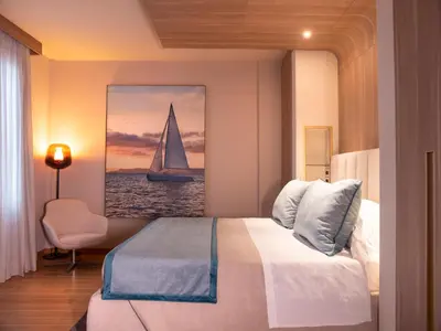 Letto o letti in una camera di Miramare Suites