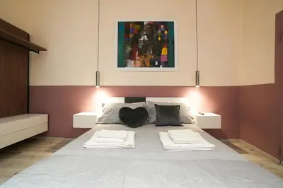 Letto o letti in una camera di 300m dal Duomo - Due Magnifici Appartamenti Moderni