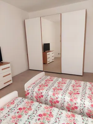 Letto o letti in una camera di Residenza S.Ambrogio