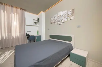 Letto o letti in una camera di 242 - Camera Est - Affittacamere Sara Home Chiavari, 200Metri dal Mare