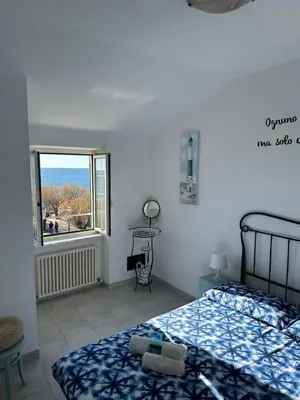 Letto o letti in una camera di Perla Marina