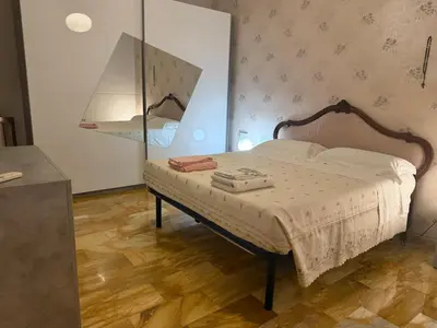 Letto o letti in una camera di La casa del papa'