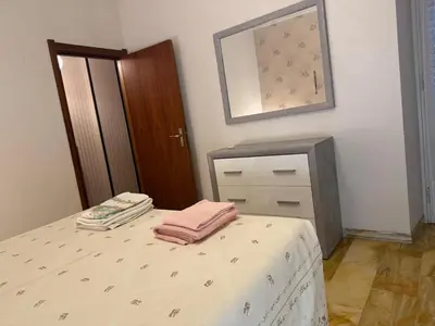 Letto o letti in una camera di La casa del papa'