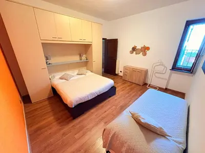 Letto o letti in una camera di Casa Otto