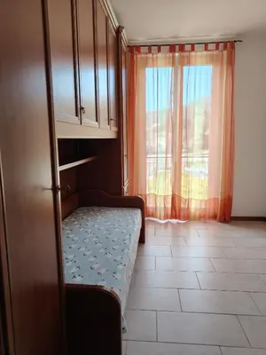 Letto o letti in una camera di Appartamento Iris