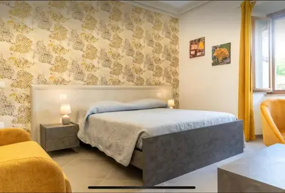Letto o letti in una camera di Villa Amanda