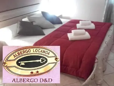Letto o letti in una camera di Albergo onlysleep