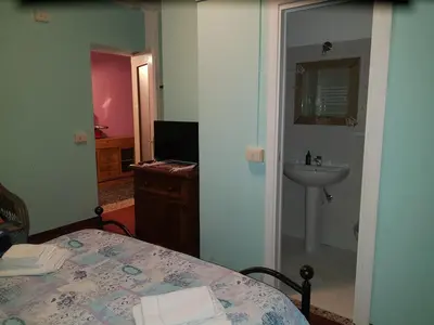 Letto o letti in una camera di B&b Al Paradis