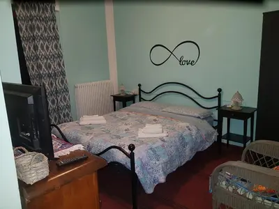 Letto o letti in una camera di B&b Al Paradis