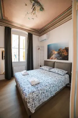 Letto o letti in una camera di BnBina2: nel centro di Chiavari