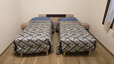 Letto o letti in una camera di Cà Mandarein