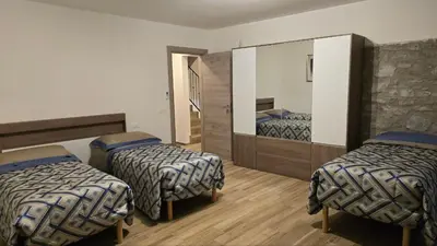 Letto o letti in una camera di Cà Mandarein