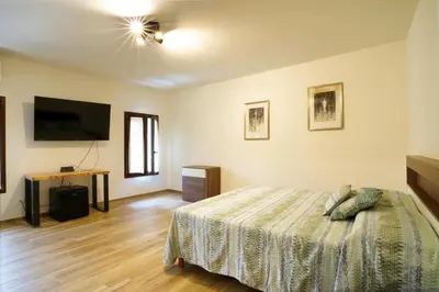 Letto o letti in una camera di Cà Mandarein