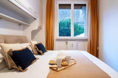Letto o letti in una camera di Le Pleiadi by PortofinoVacanze