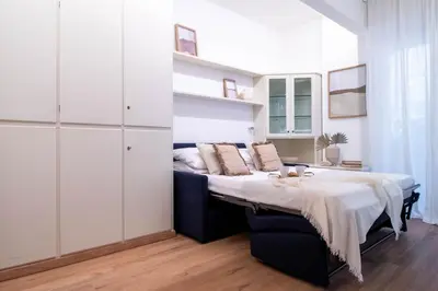 Letto o letti in una camera di Le Pleiadi by PortofinoVacanze