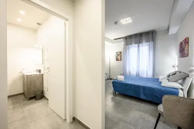 Letto o letti in una camera di College Suites
