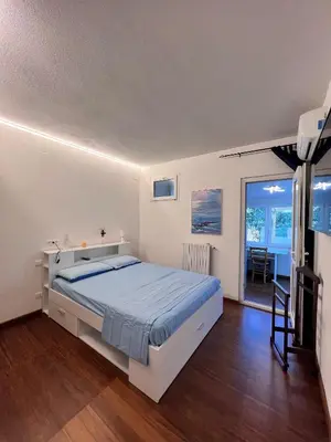 Letto o letti in una camera di Santa Giulia Seascape & Garden Rooms