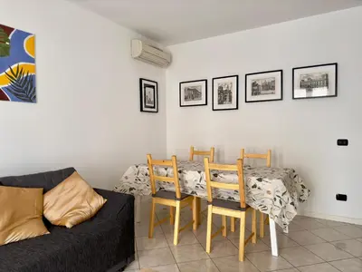 Area soggiorno di Piacenza City House Garden