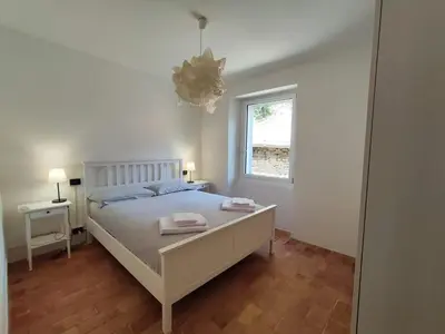 Letto o letti in una camera di La casa nel borgo