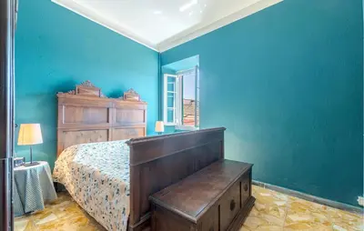 Letto o letti in una camera di Casa La Carrugina