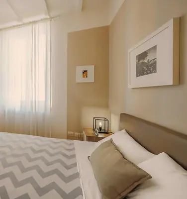 Letto o letti in una camera di Dimora Farini