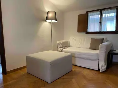 Area soggiorno di Liberty Apartment Franceschetta