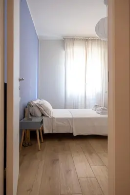 Letto o letti in una camera di CasaLucia alle porte del centro