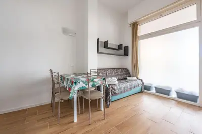 Area soggiorno di GuestHost - Deiva Marina Sea House! Functional Apartment