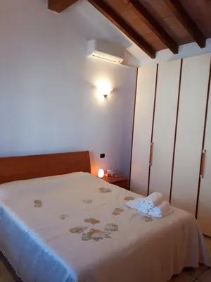 Letto o letti in una camera di Villetta Tora