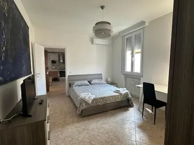 Letto o letti in una camera di Mutina Suite 3