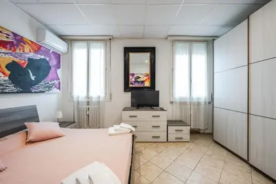Letto o letti in una camera di Mutina Suite 7