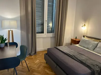 Letto o letti in una camera di Cremona Suite