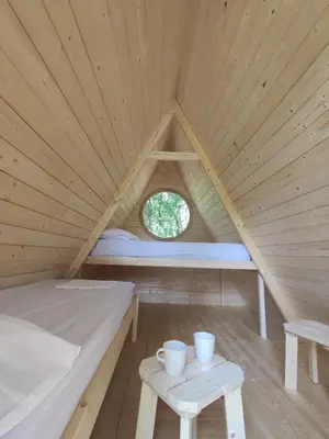 Letto o letti in una camera di La Tana nel bosco di Casa Amilton