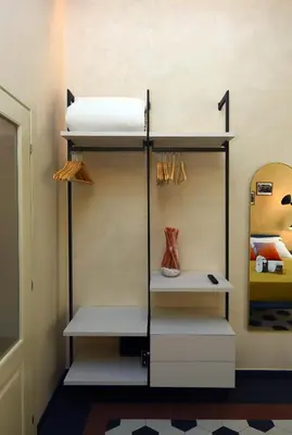 Letto o letti in una camera di Le stanze sopra i portici