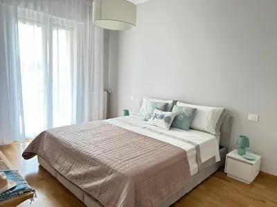 Letto o letti in una camera di La Dolce Vita Cerisola by PortofinoVacanze