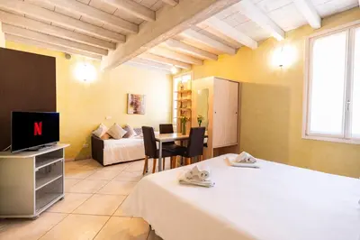 Letto o letti in una camera di Al Podestà - Centro Storico