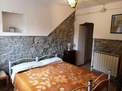 Letto o letti in una camera di La Debbia Ranch