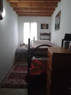 Letto o letti in una camera di La Debbia Ranch