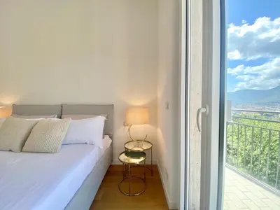 Letto o letti in una camera di CasaViva - Terrace Apt with Parking in Rapallo