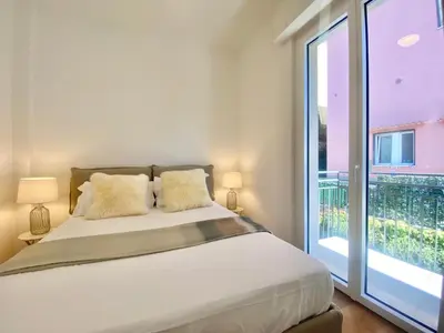 Letto o letti in una camera di CasaViva - Terrace Apt with Parking in Rapallo
