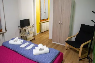 Letto o letti in una camera di Maruffi 17 zona clinica bilocali