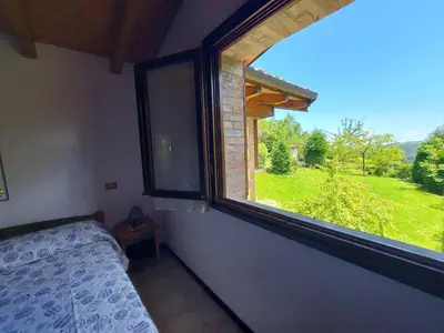Letto o letti in una camera di IZZ1 Apartments - Loft Serramazzoni