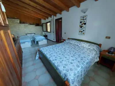Letto o letti in una camera di IZZ1 Apartments - Loft Serramazzoni